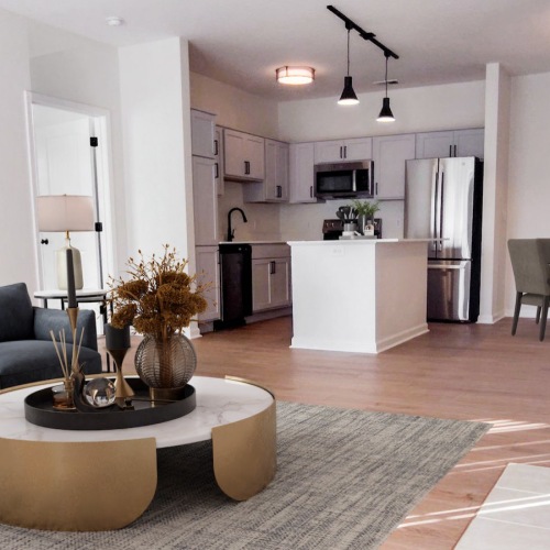 Wide open living areas perfect for entertaining	 living room with couch coffee table and view of the kitchen